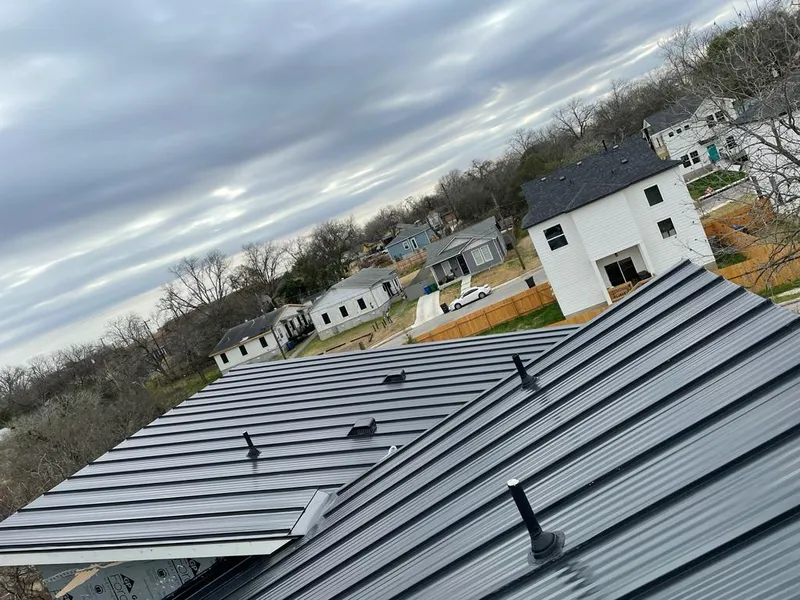 Standing seam metal roof panels with vents for Skylight Repair in Conley